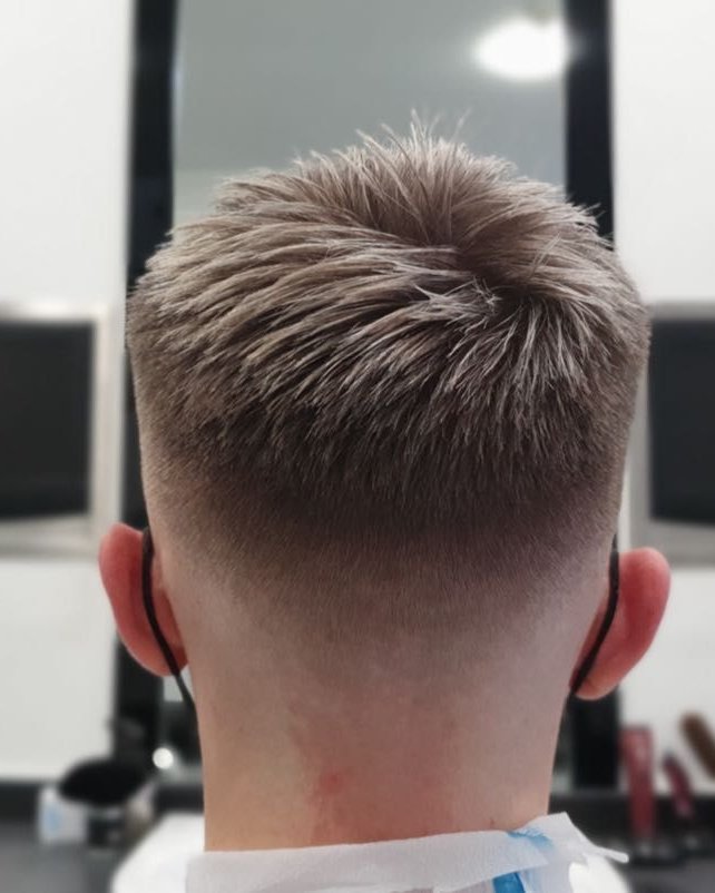 A textured skin fade, finished from behind at Modern Barbers Leeds