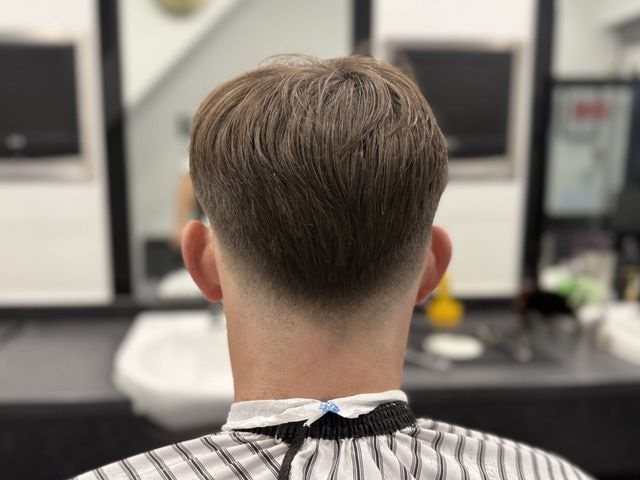 A fresh cut finished at Modern Barbers Leeds — textured top with a clean taper